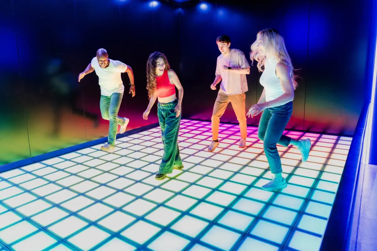 A group taking on an interactive challenge at Time Mission